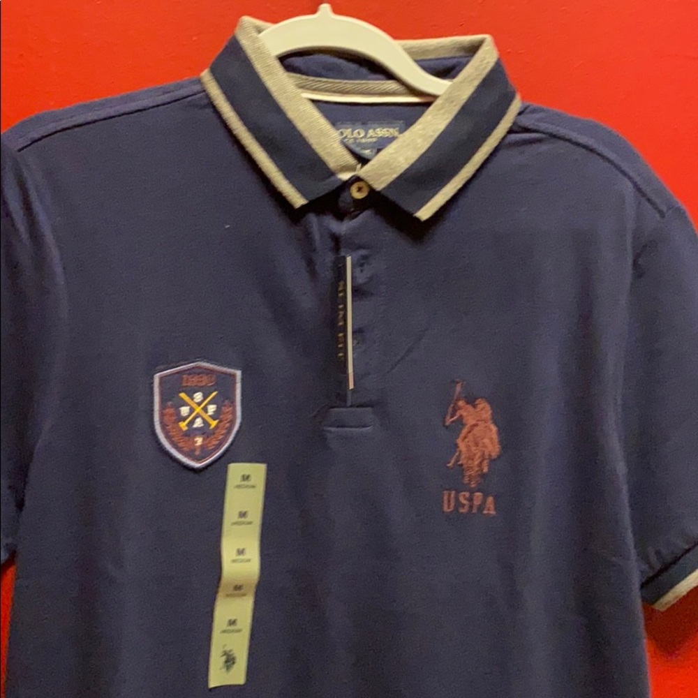 Brand name navy blue polo